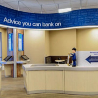 suspended sign above bank counter